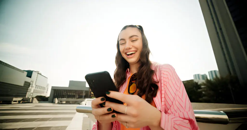https://www.istockphoto.com/photo/outdoor-woman-and-happy-in-city-with-smartphone-on-mobile-app-social-media-and-gm2183088031-601994876?searchscope=image%2Cfilm